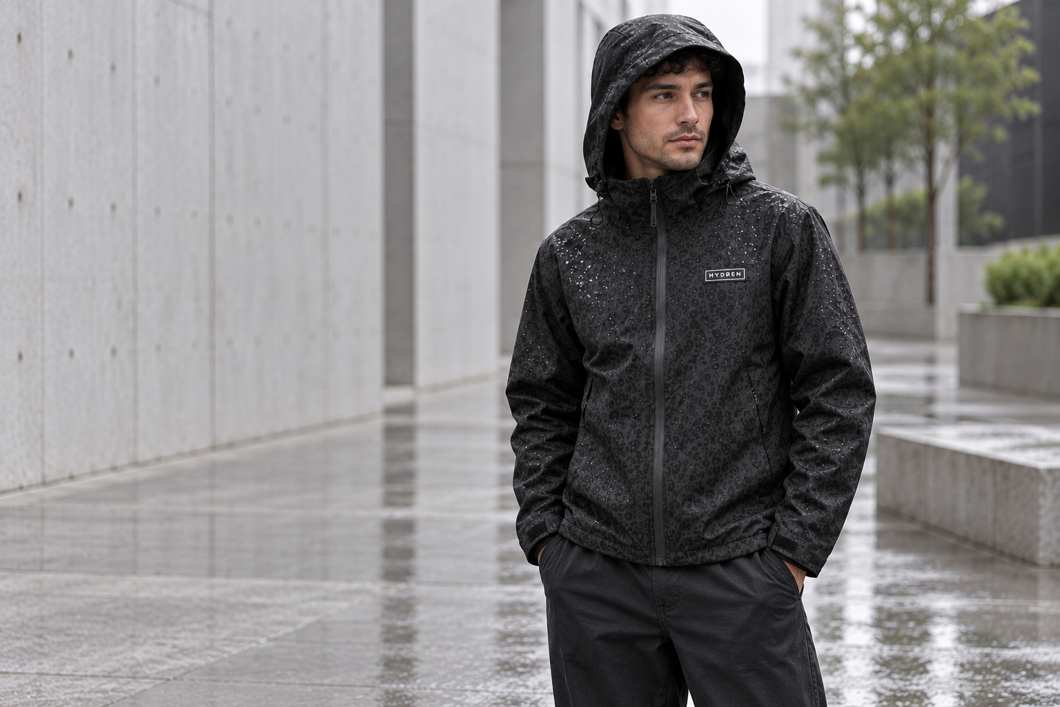 Man wearing the black hooded Hydren jacket
